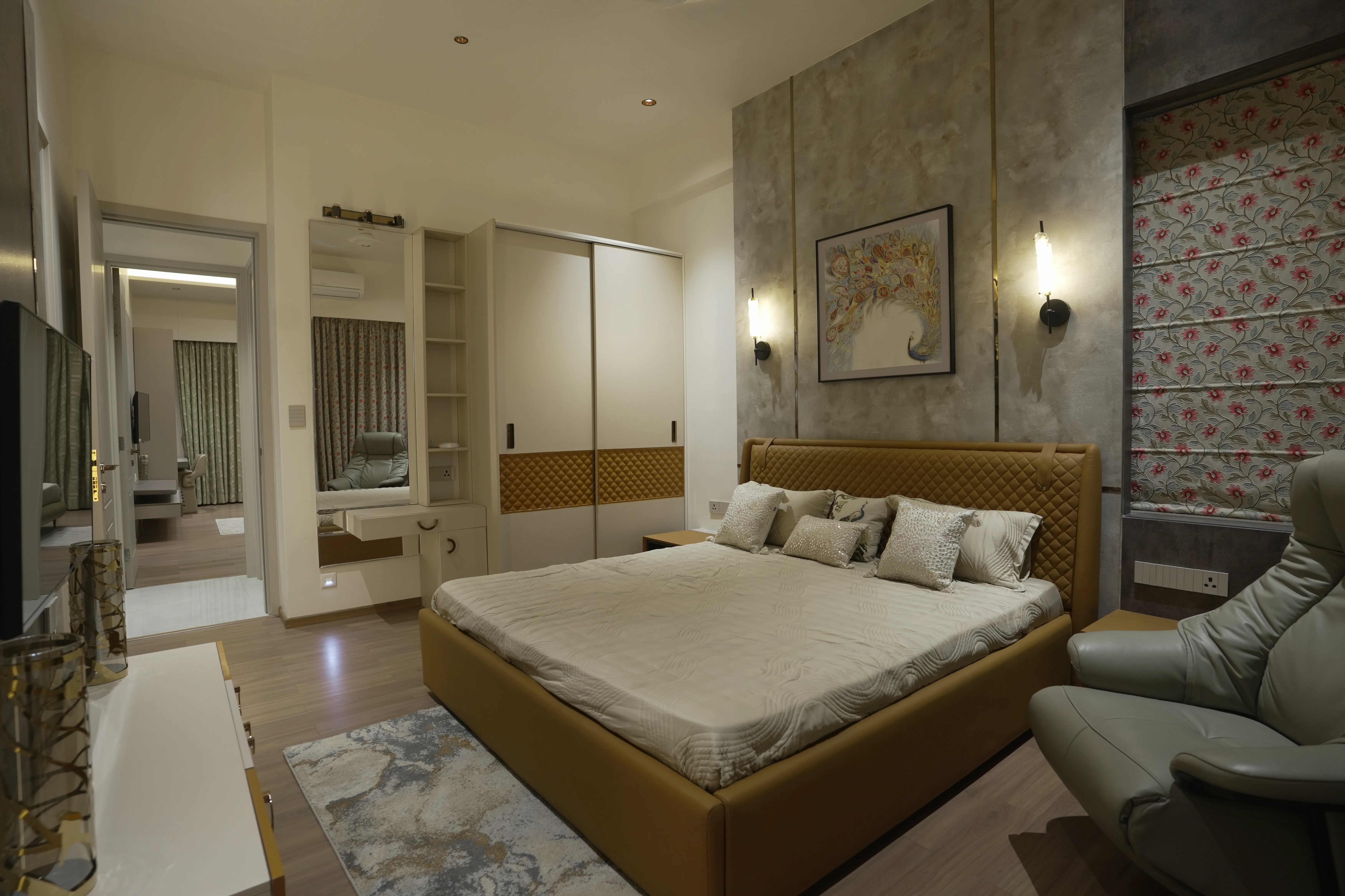 Master bedroom with wooden laminate flooring in a Majestic Sky Bungalow 4 BHK apartment, East Nagpur